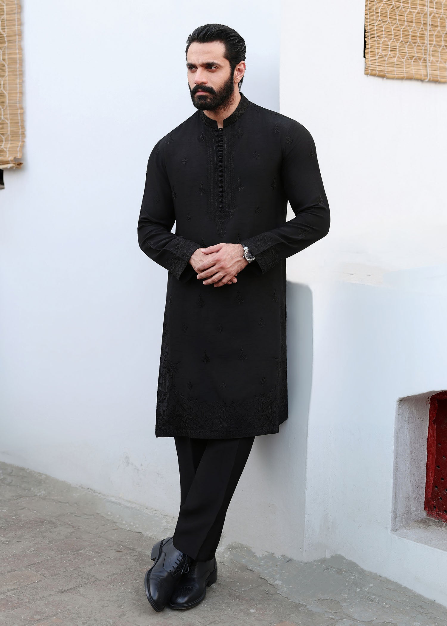 Azlan black sherwani front view - Kanwal Malik menswear