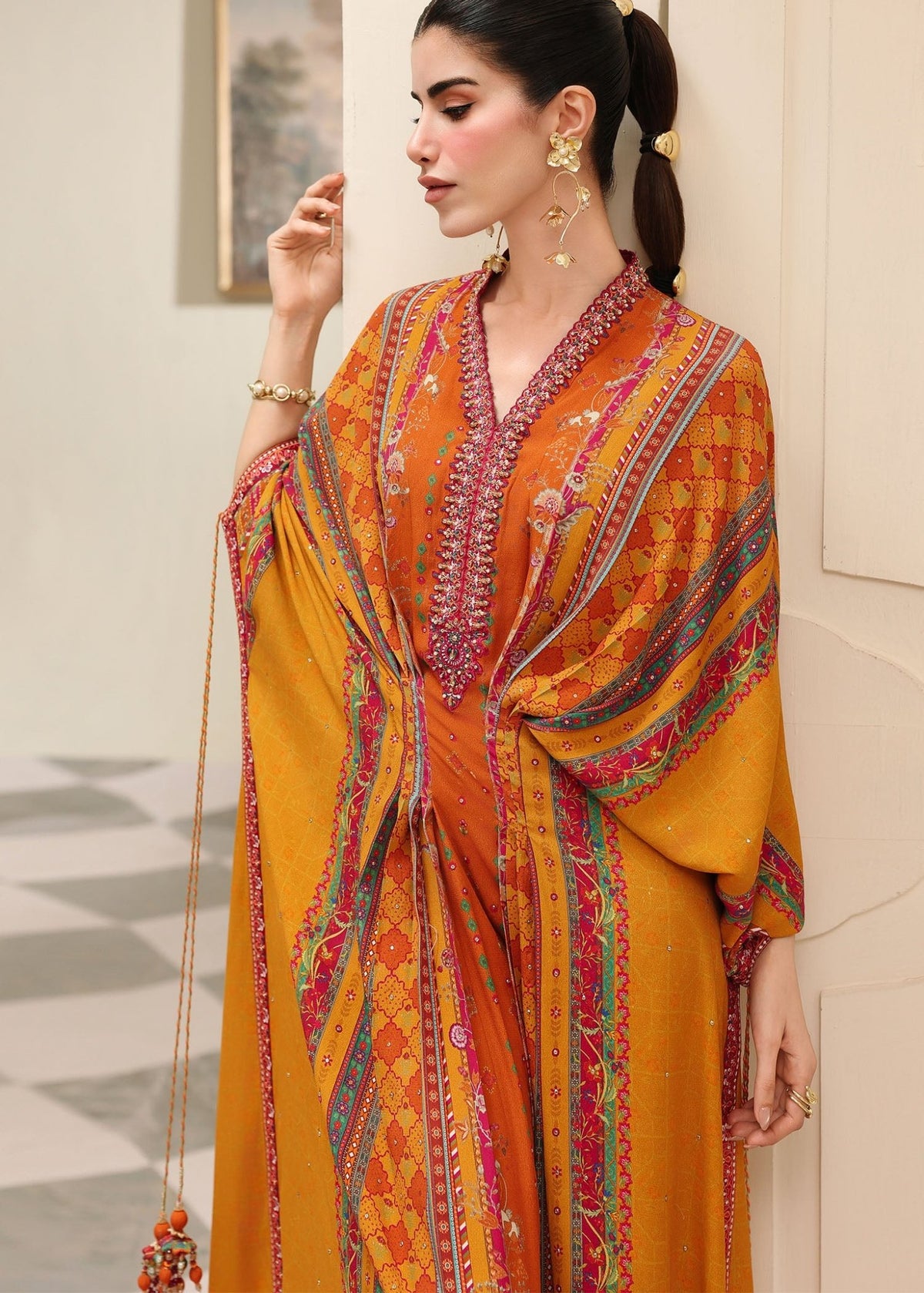 Eira orange back view - Kanwal Malik