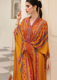 Eira orange back view - Kanwal Malik