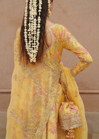 Hoorain zest yellow ensemble back view - Kanwal Malik