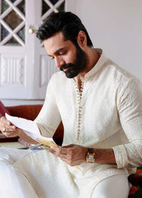 Raamis off-white styled look - Kanwal Malik menswear