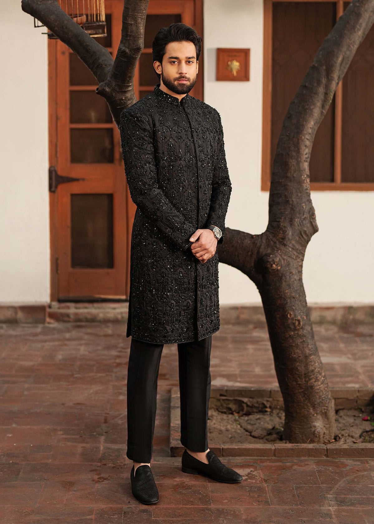 Taseer black sherwani front view - Kanwal Malik menswear