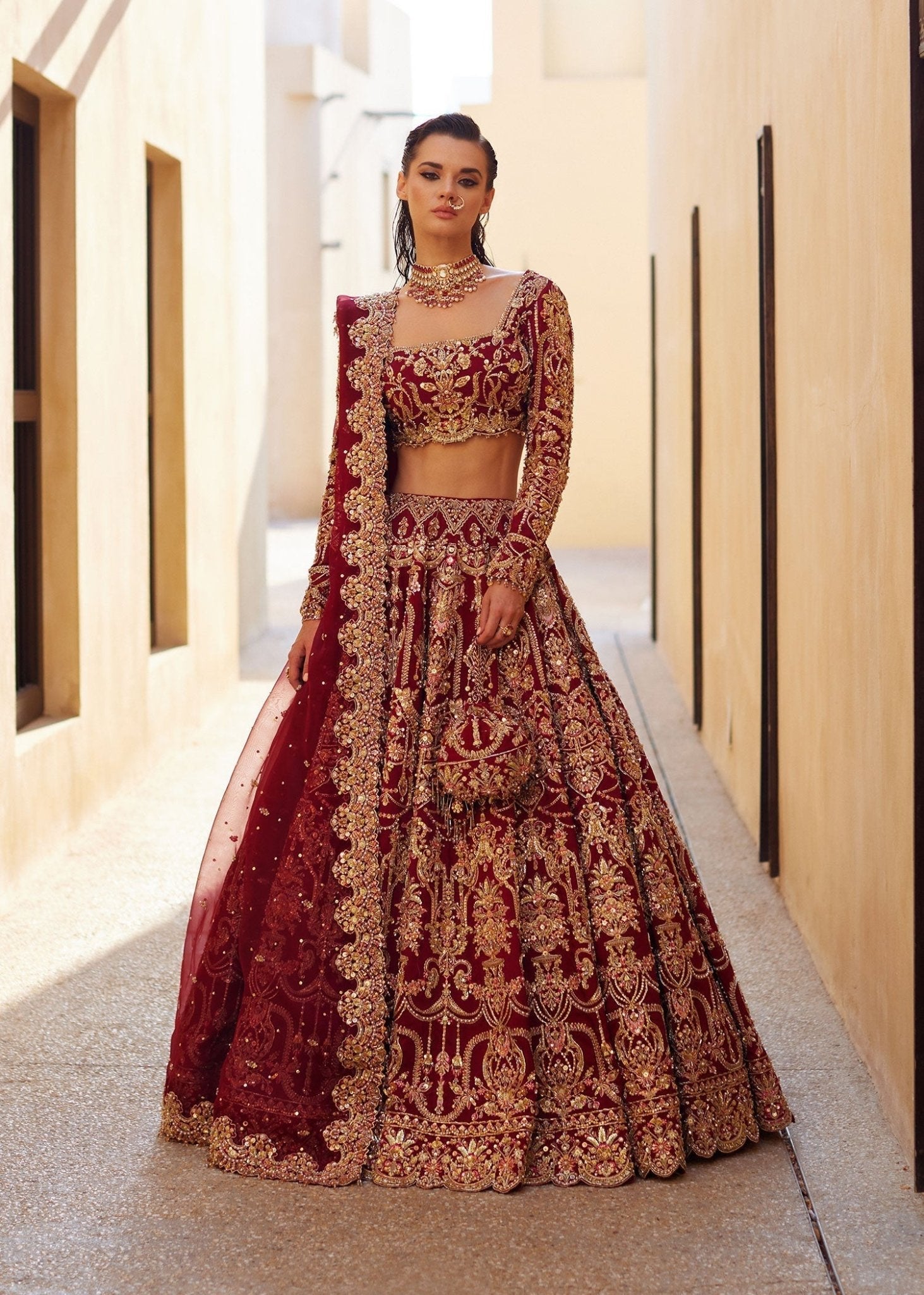 Zarwa red bridal lehenga choli front view - Kanwal Malik bridal couture